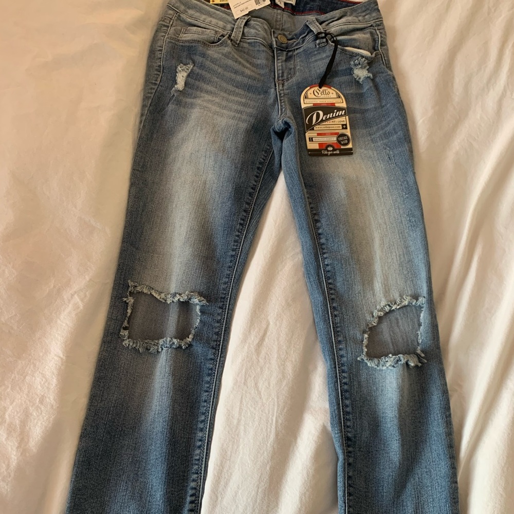 Destroyed frayed ankle stretch skinny vintage wash